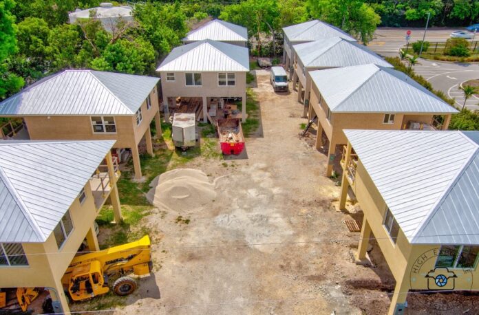 an aerial view of a construction site in a residential area