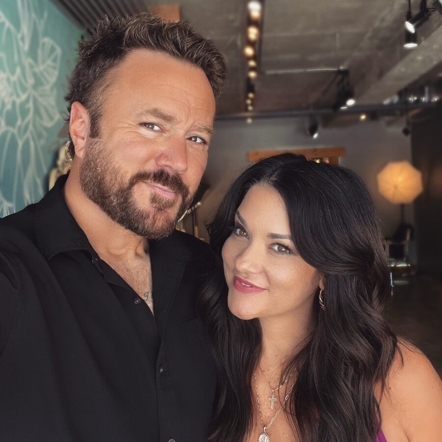 a man and a woman taking a selfie