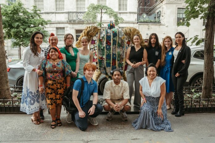 a group of women standing next to each other