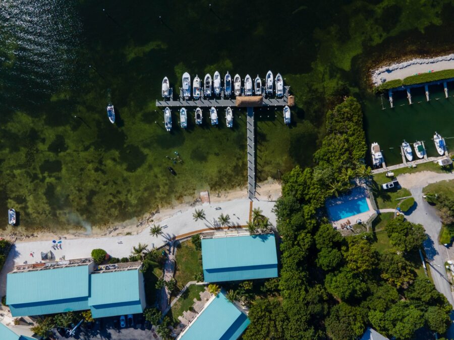 an aerial view of boats docked at a dock