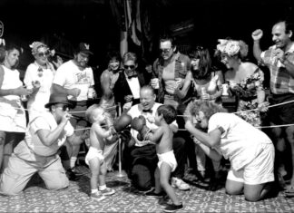 a black and white photo of a group of people