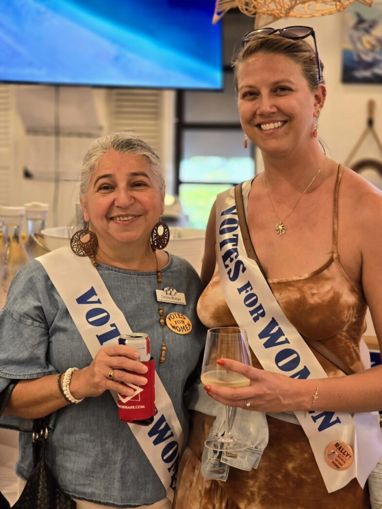 a couple of women standing next to each other