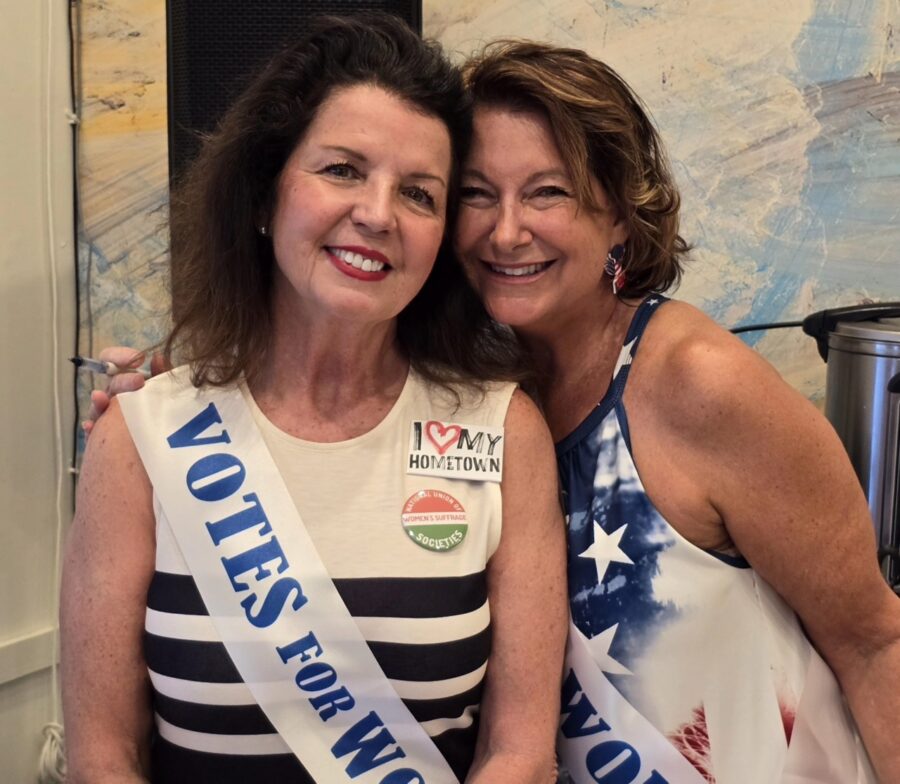 a couple of women standing next to each other