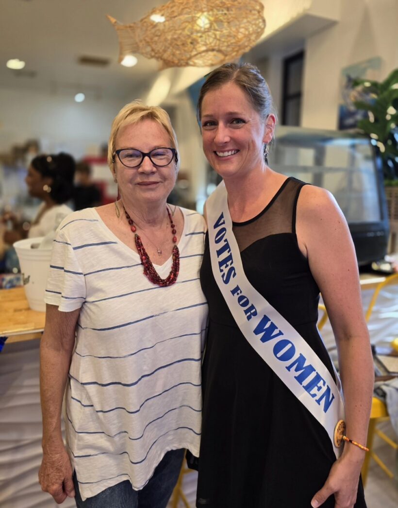 a couple of women standing next to each other