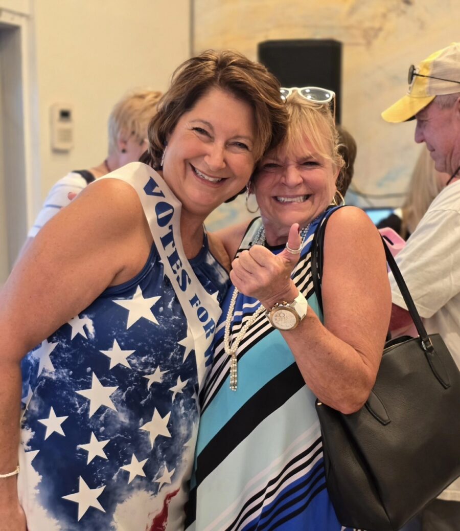 a couple of women standing next to each other