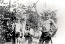 a group of young men standing next to each other