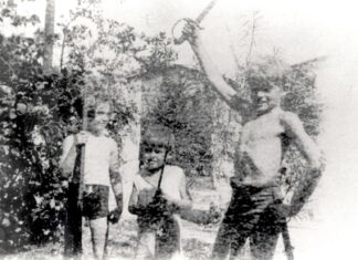 a group of young men standing next to each other