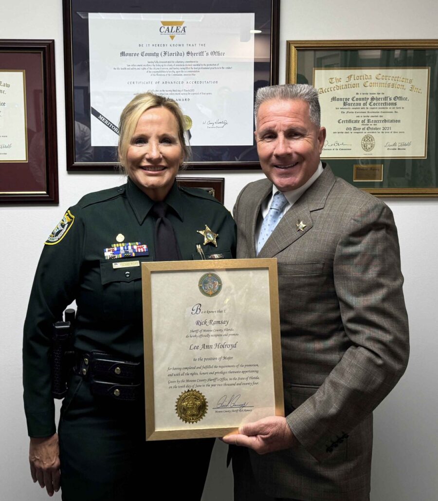 a man and a woman standing next to each other