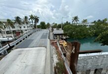 a view of a bridge over a body of water