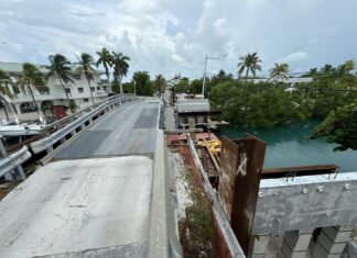 a view of a bridge over a body of water