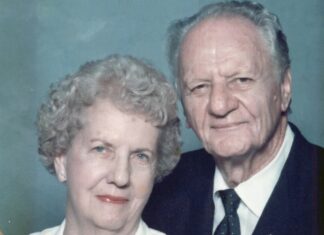 a man and a woman posing for a picture