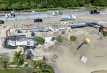 an aerial view of a construction site in the middle of a road