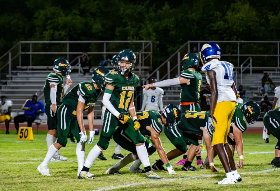 a group of young men playing a game of football