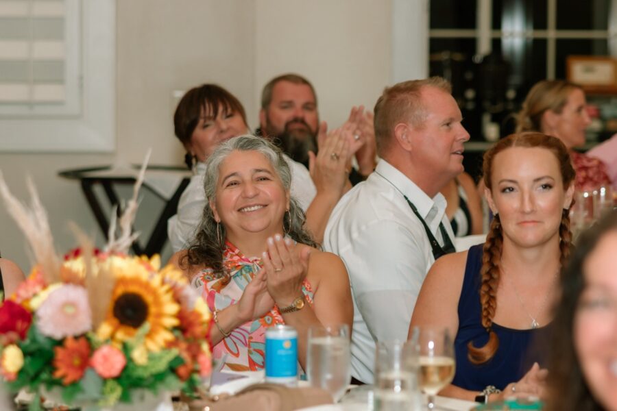 a group of people sitting at a table