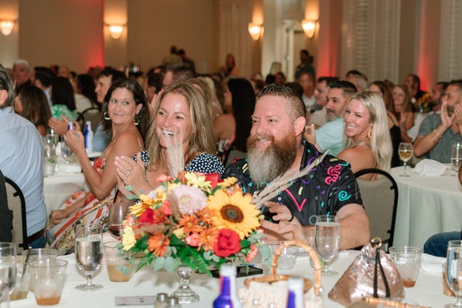 a group of people sitting at a table