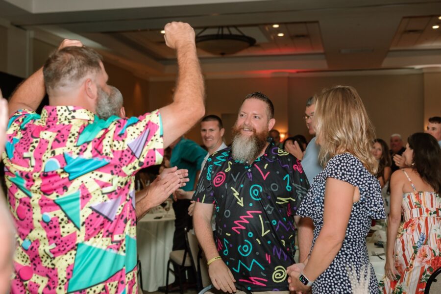 a group of people dancing at a party