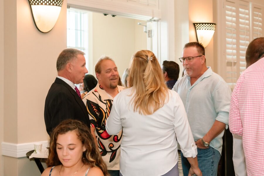 a group of people standing in a room