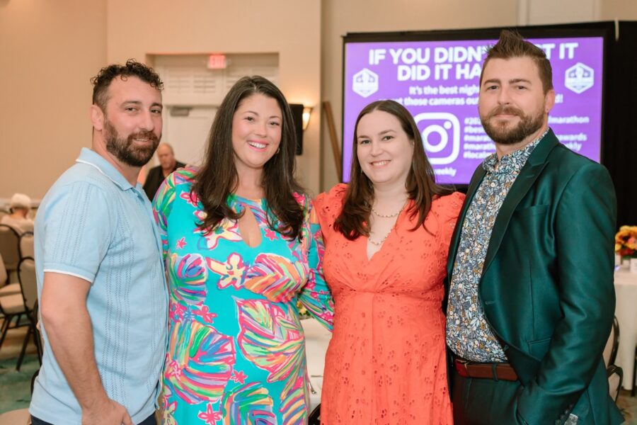 a group of people standing next to each other