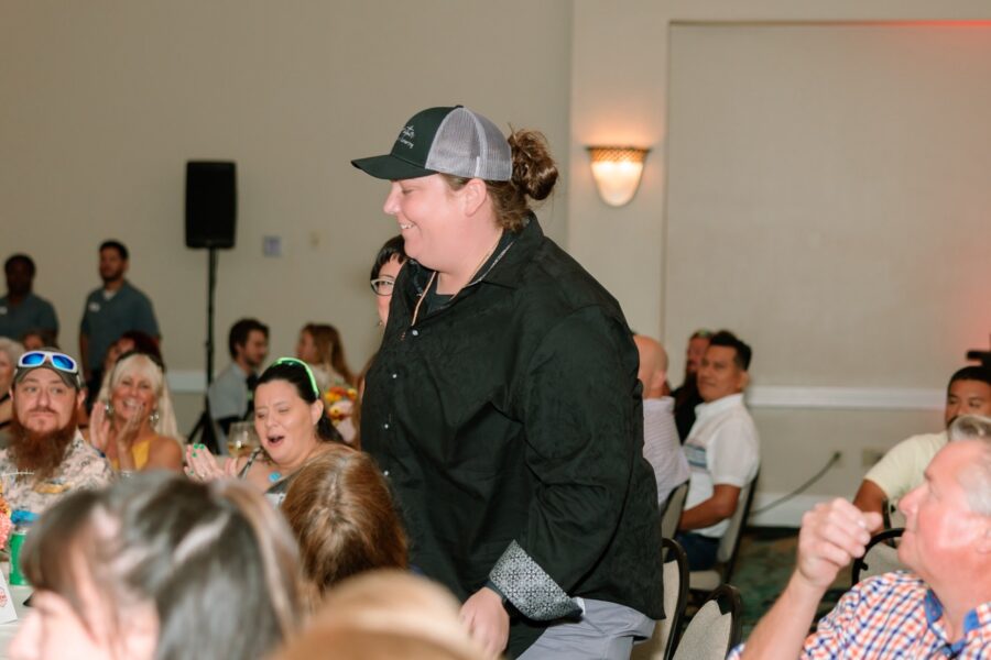 a man standing in front of a crowd of people