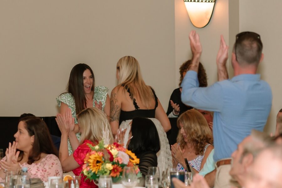 a group of people sitting around a table