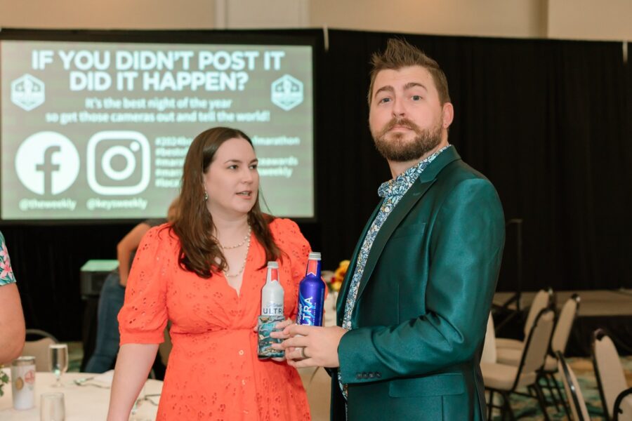 a man and a woman standing next to each other