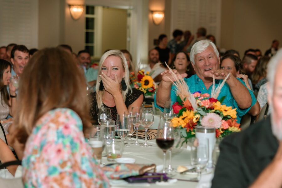 a group of people sitting around a table