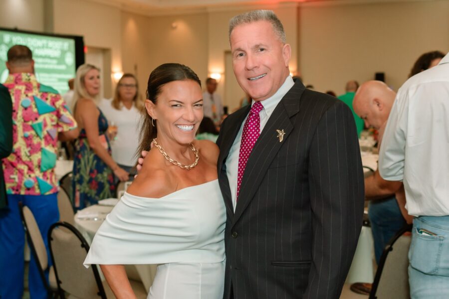 a man and a woman standing next to each other