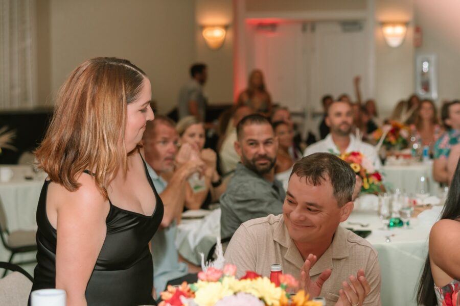 a group of people sitting around a table