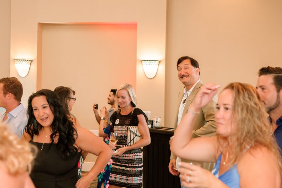 a group of people standing in a room