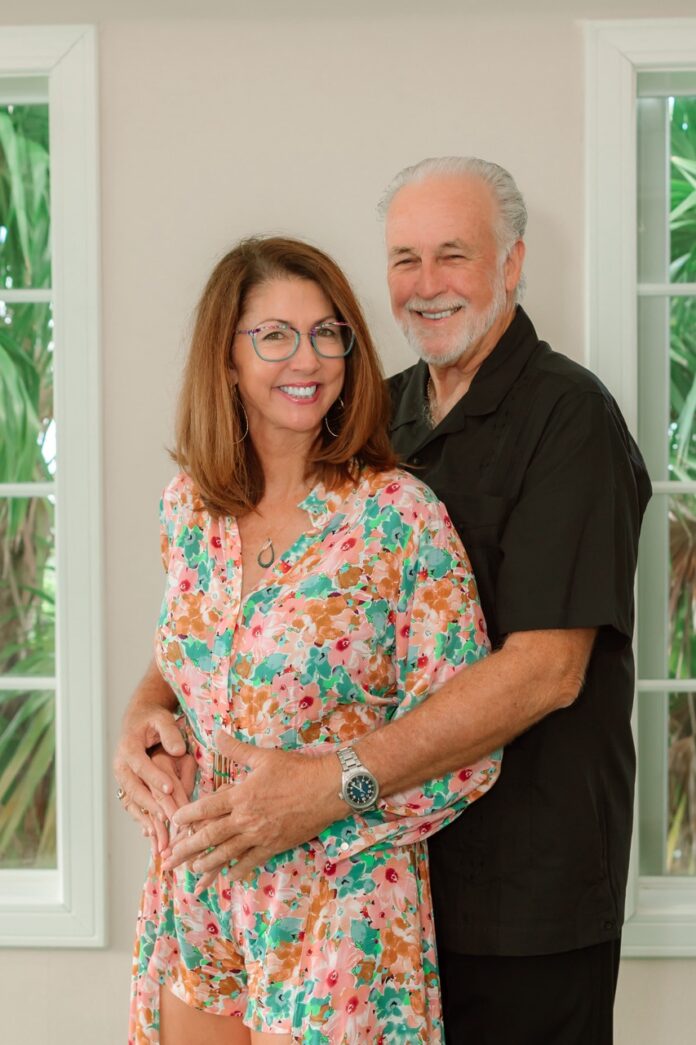 a man and a woman standing next to each other