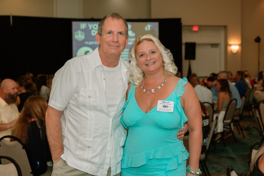 a man and a woman standing next to each other