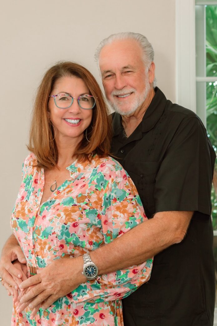 a man and a woman standing next to each other