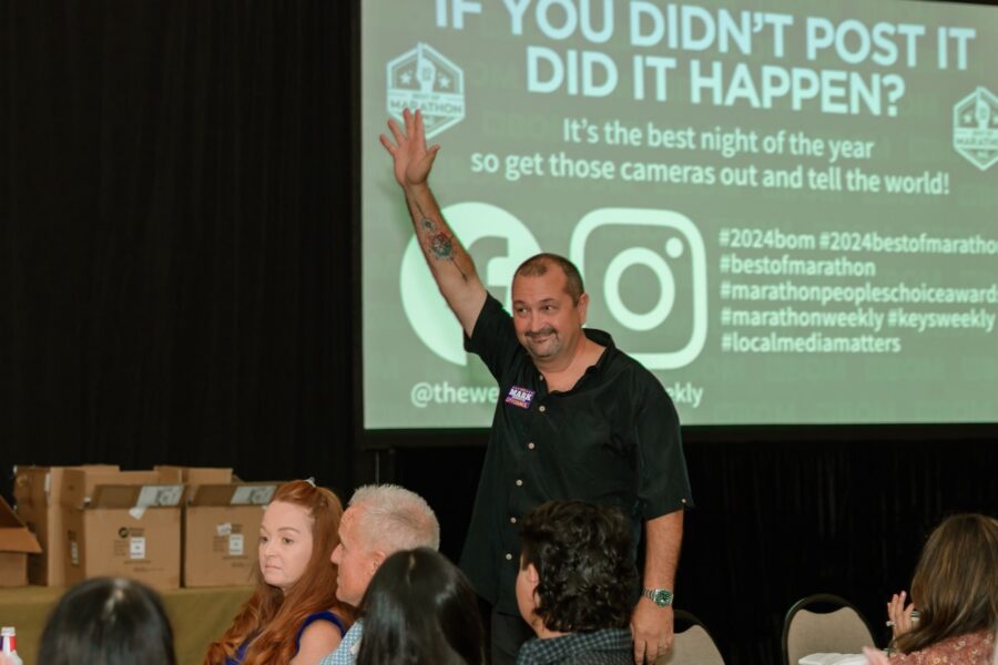 a man giving a presentation to a group of people