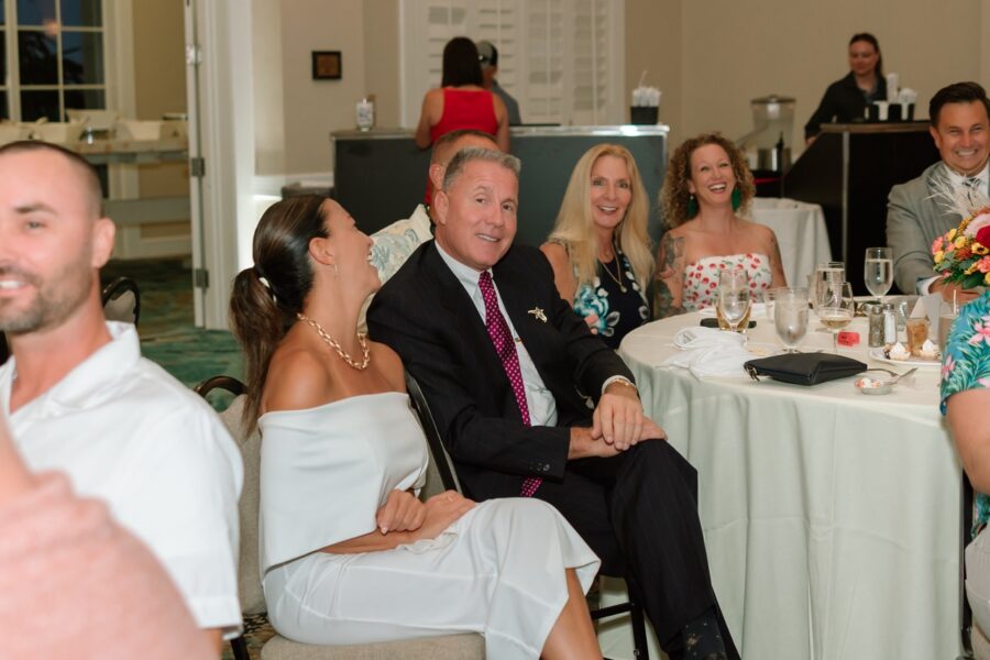 a group of people sitting around a table