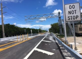 a road with a do not stop sign on it