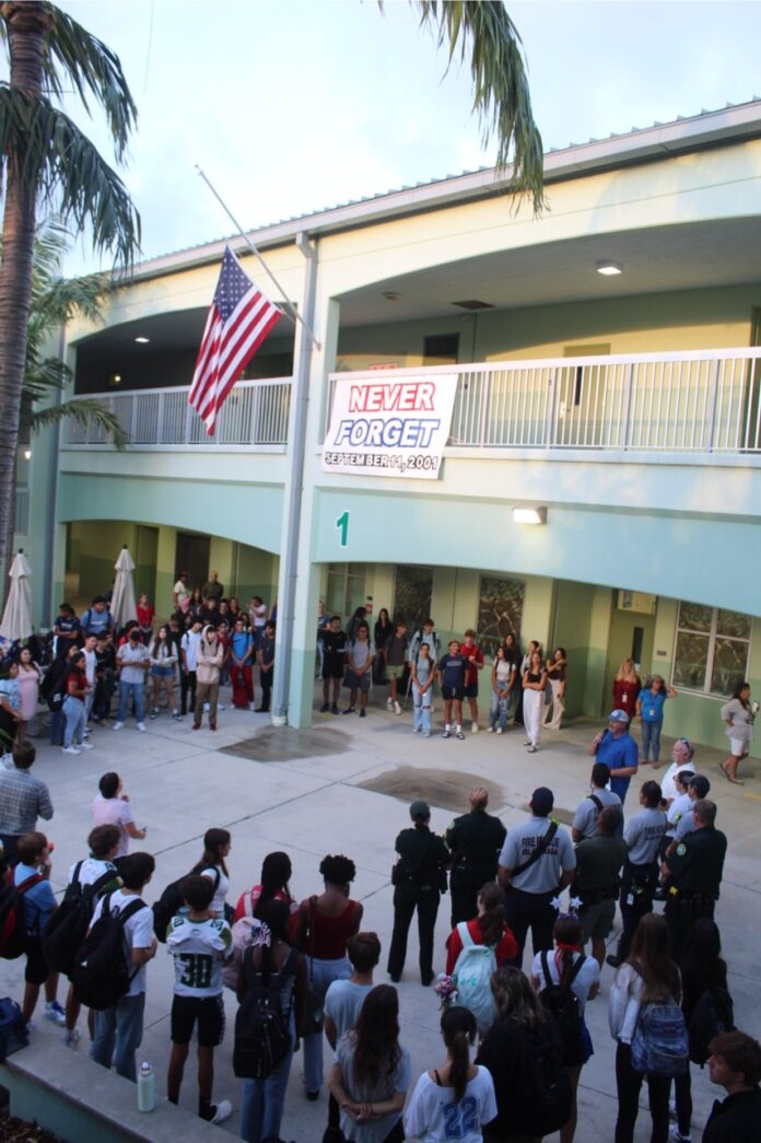 a group of people standing in front of a building