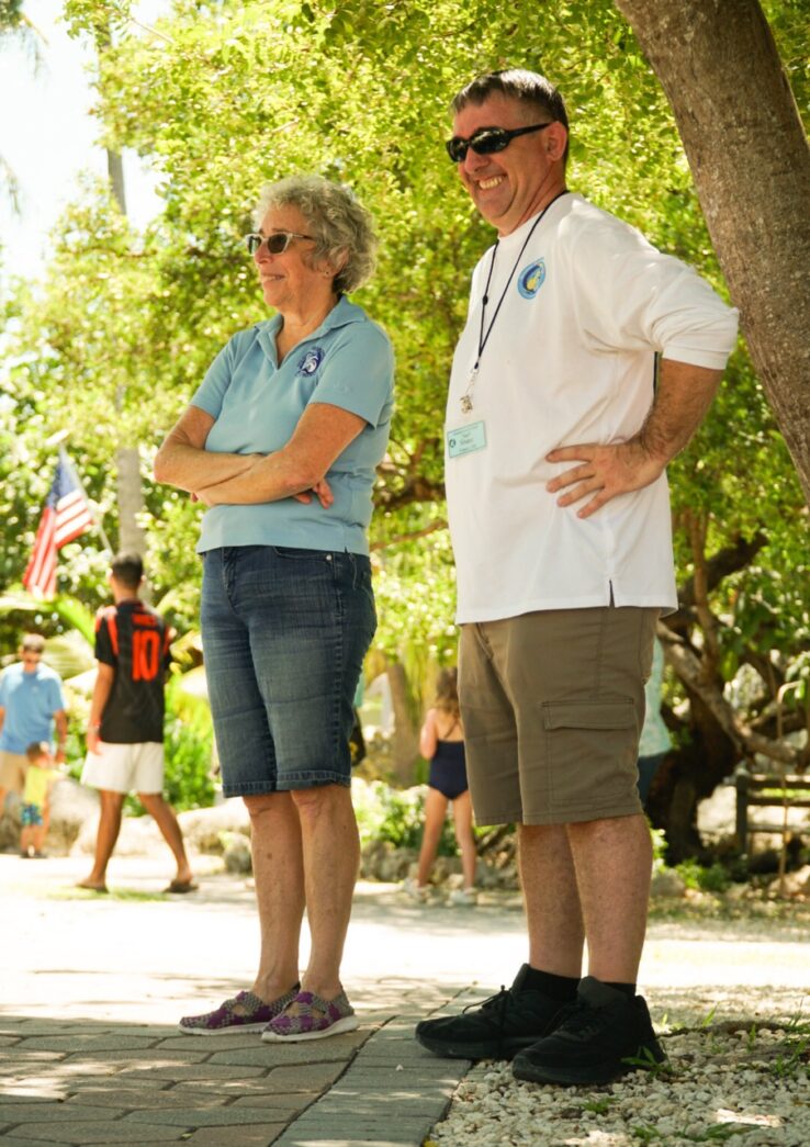 a man and a woman standing next to each other