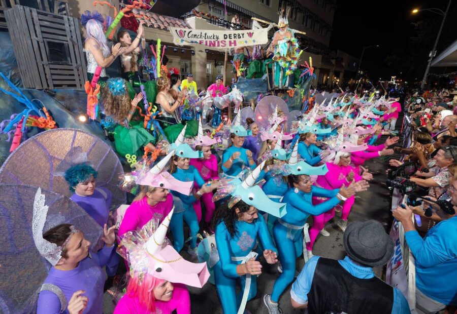 a large group of people dressed in costumes