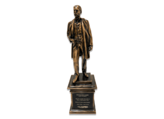 a bronze statue of a man standing on a pedestal