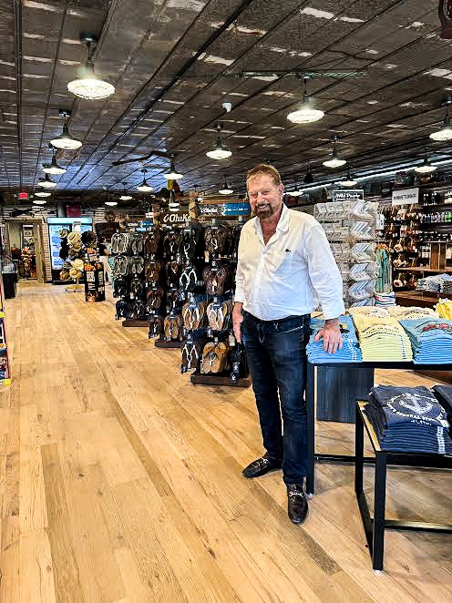 a man standing in the middle of a store