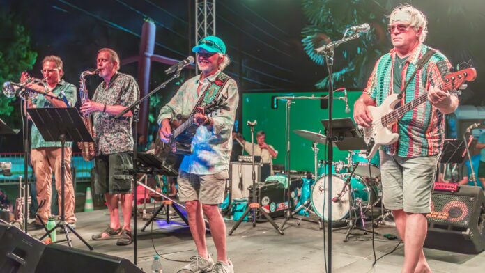 a group of people that are standing on a stage