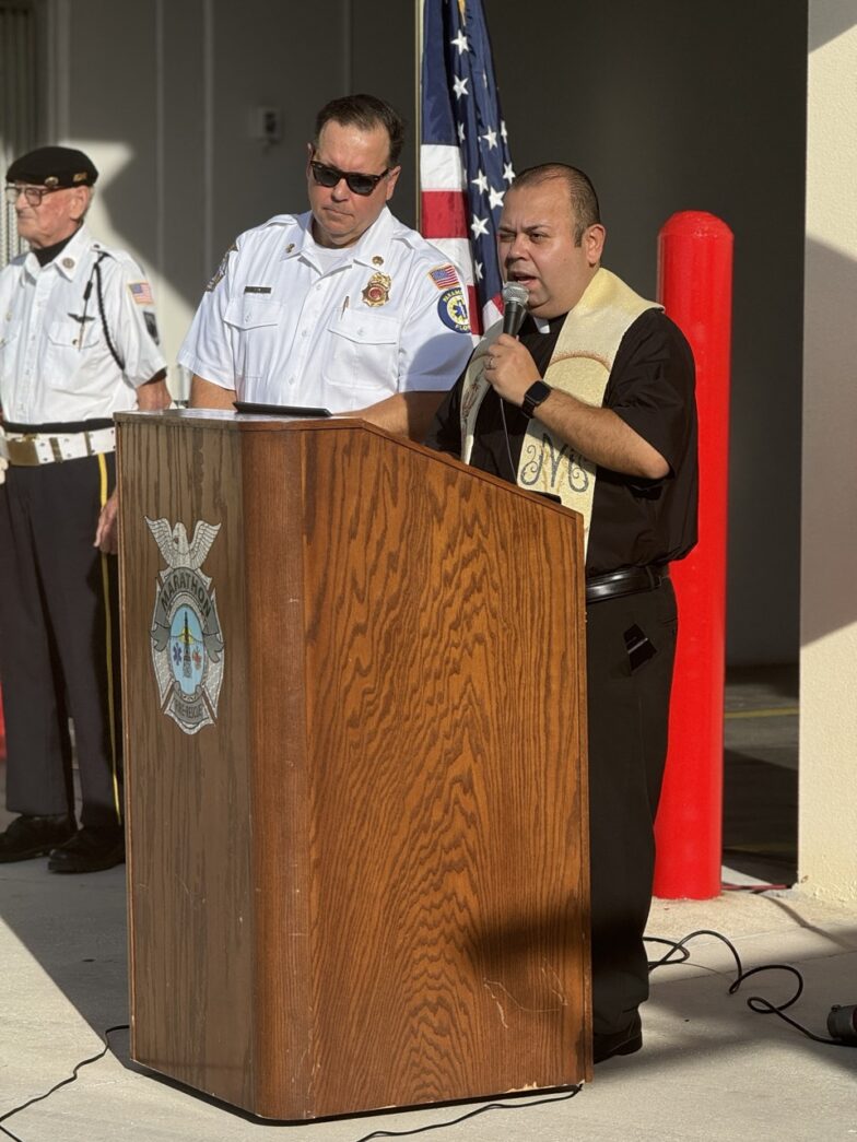 a group of men standing around a wooden podium