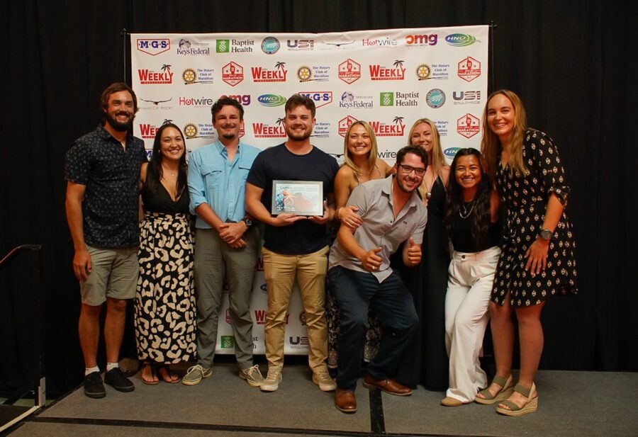 a group of people standing on a stage