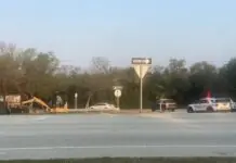 a couple of trucks that are sitting in the street