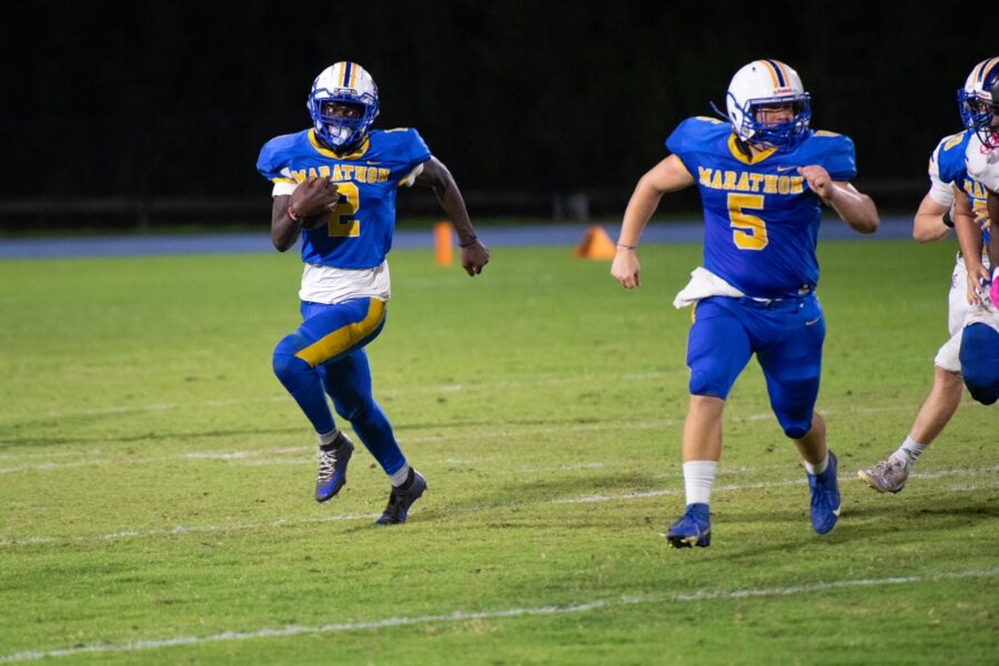 a group of young men playing a game of football