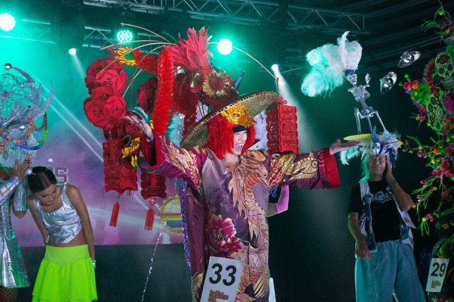 a group of people standing on top of a stage