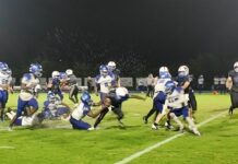 a football game is being played on the field