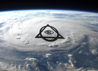 an eye in the center of a triangle on top of the earth