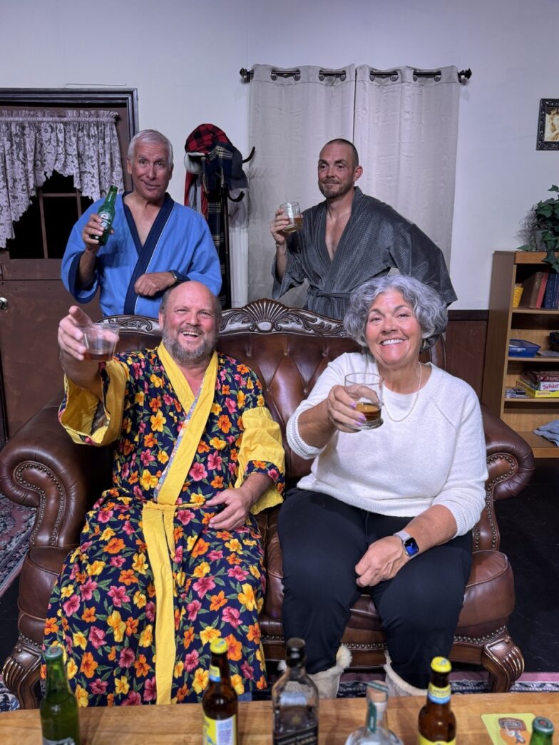 a group of people sitting around a living room