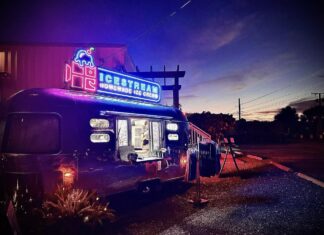 a food truck parked on the side of the road